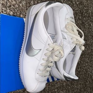 White and grey Nike sneakers